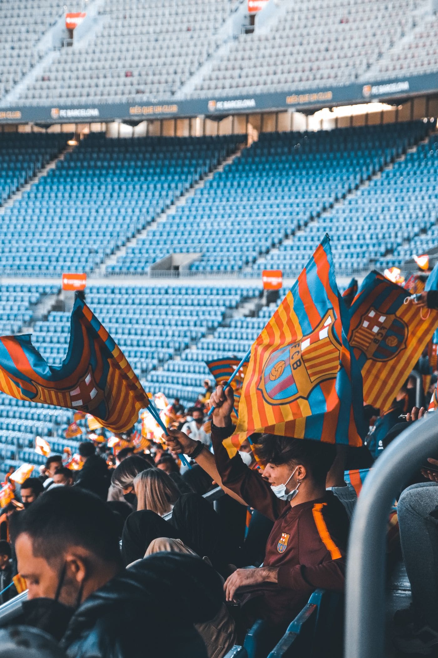 Fans watching an international soccer match together.