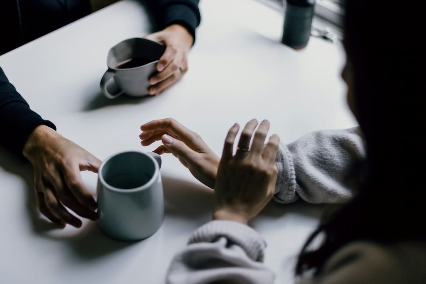 A group of friends gathered around a table.