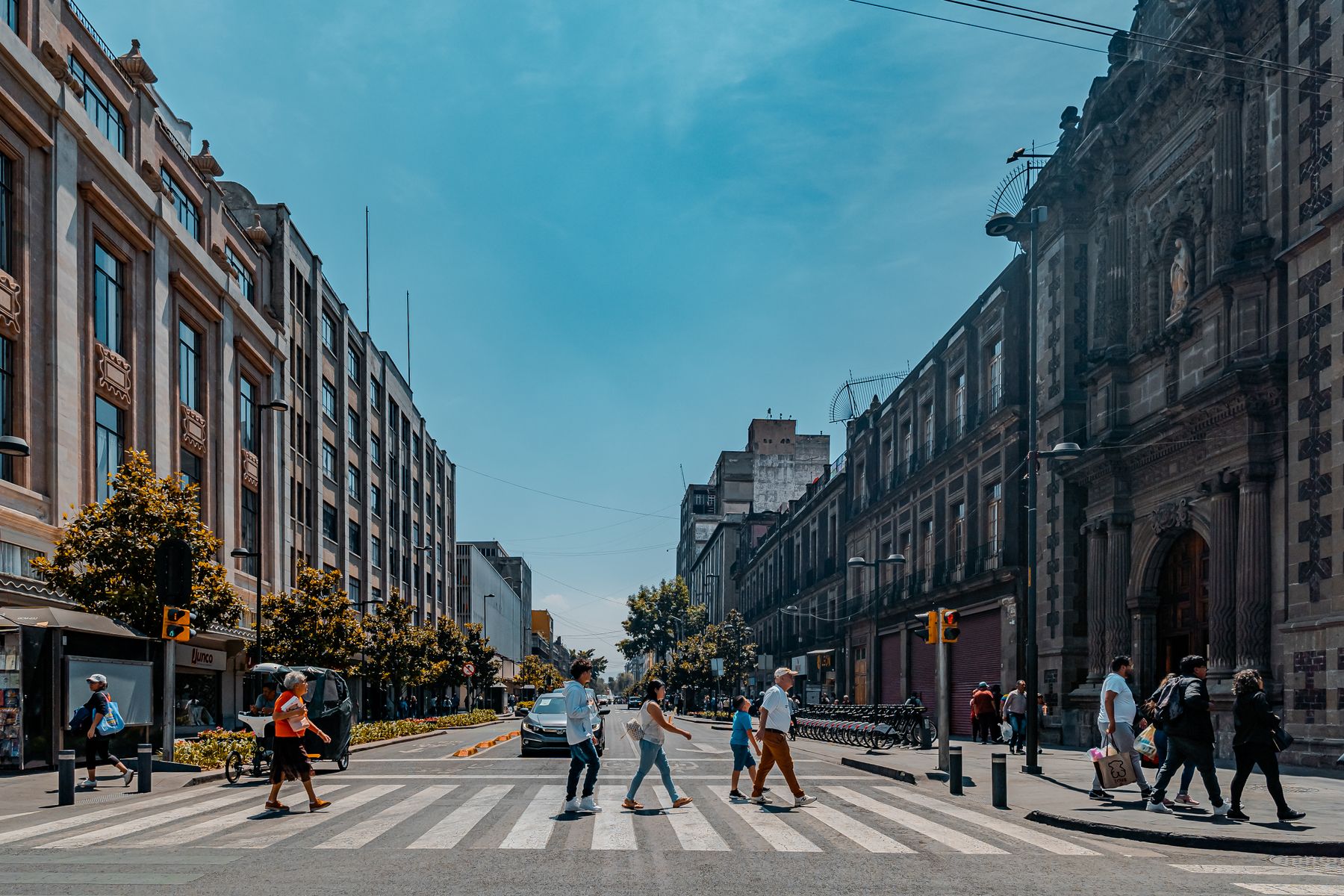 People crossing a street in Mexico City.